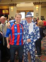 Falkirk fan in £200 custom made suit. ICT fan in jeans and an old top.